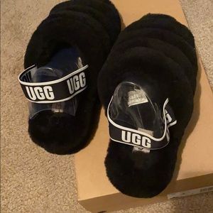 Fluffy Ugg slide slippers. Worn 2 times still new.